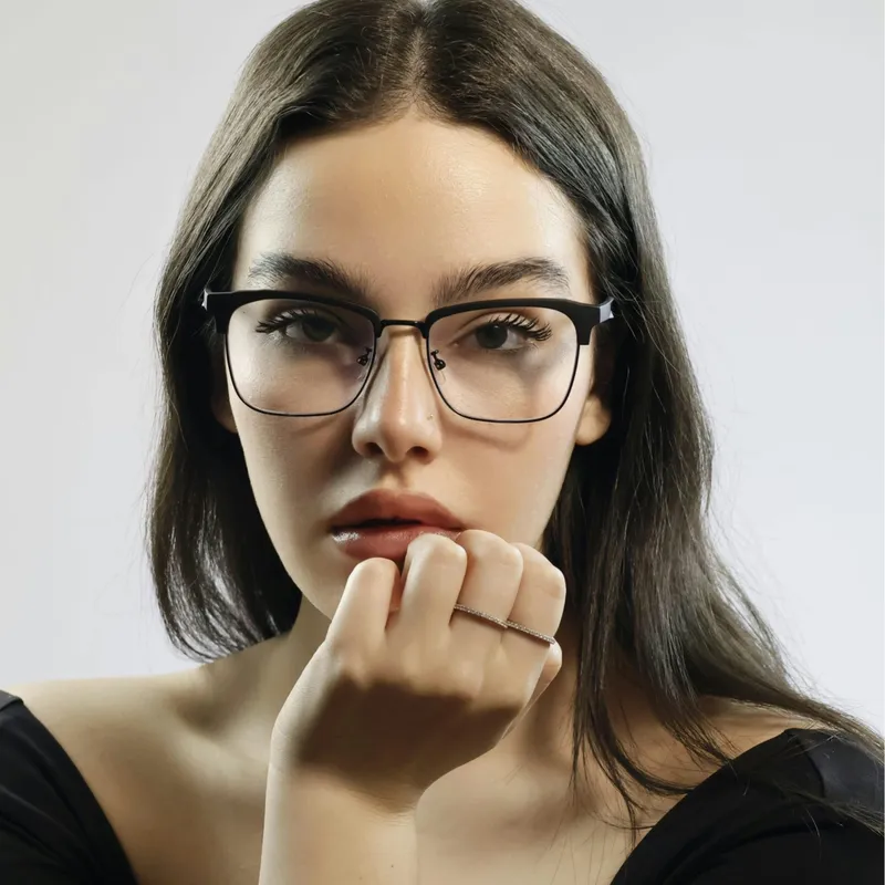 A customer wearing designer eyeglasses